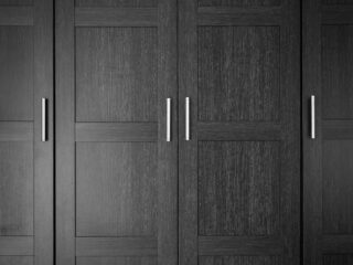 wooden closet with doors