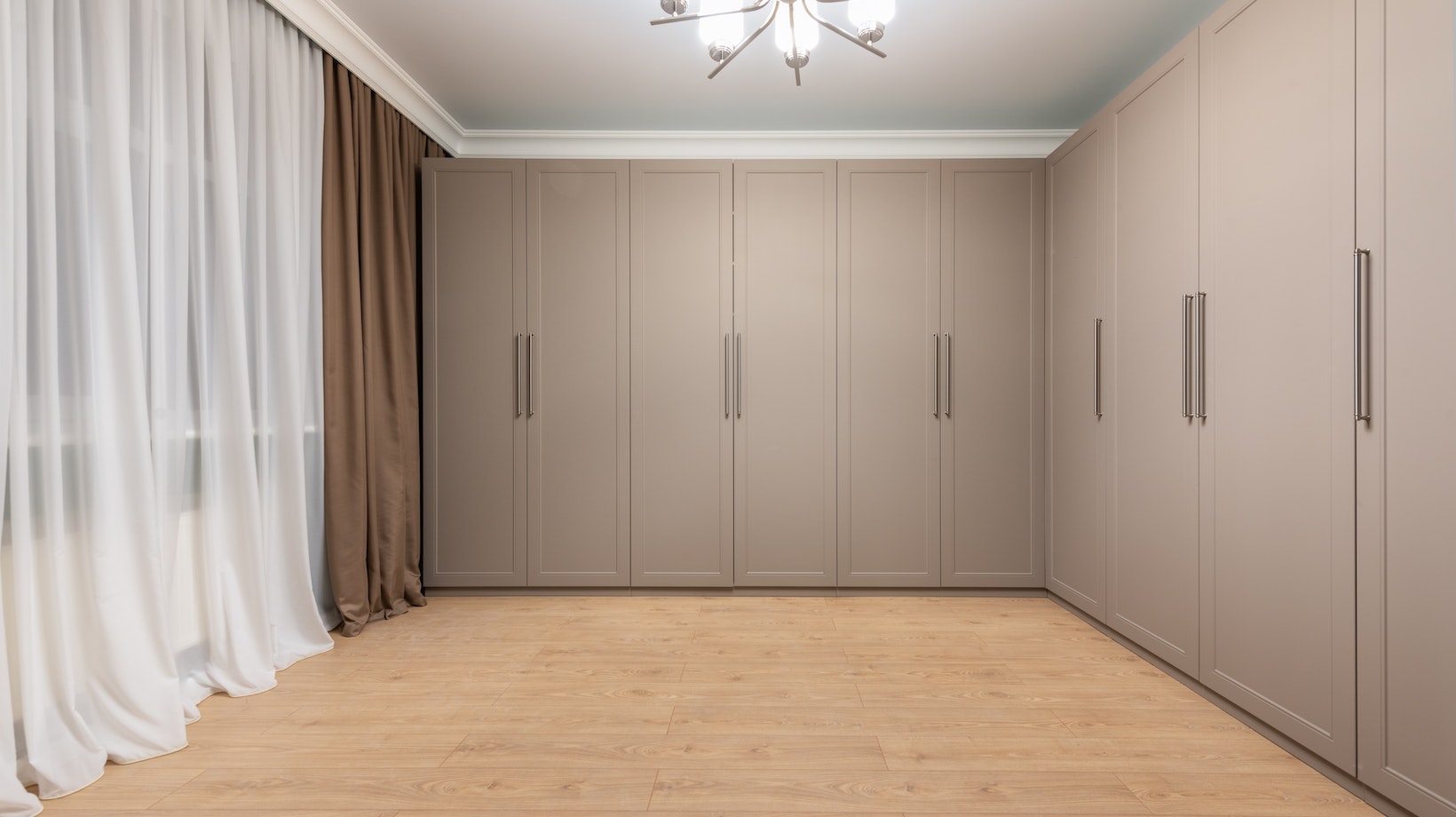 closet with curtains instead of doors