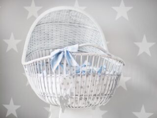 Free Baby's White and Gray Star Printed Bassinet Stock Photo